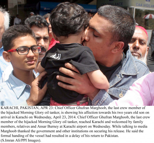 chief officer of morning glory ghufran marghoob of kisses his son after returning to karachi on wednesday photo ppi chief officer of morning glory ghufran marghoob of kisses his son after returning to karachi on wednesday photo ppi