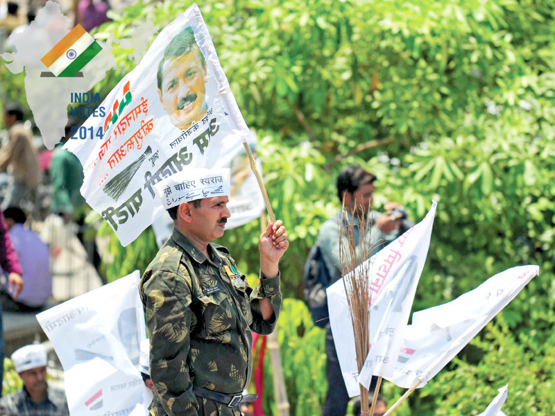 a soldier seen wearing his medals participates in an aam aadmi party rally photo afp