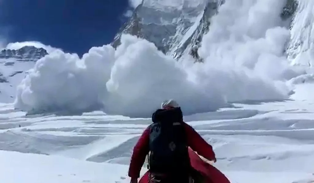 the avalanche that killed at least thirteen sherpas is pictured as it barrels down a mountain in the mount everest region photo afp the avalanche that killed at least thirteen sherpas is pictured as it barrels down a mountain in the mount everest region photo afp