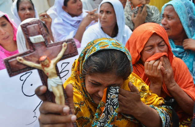 the report also called 2013 quot one of the darkest years quot for christians in pakistan with the deadliest ever attack on the community mounted in peshawar in september photo afp file