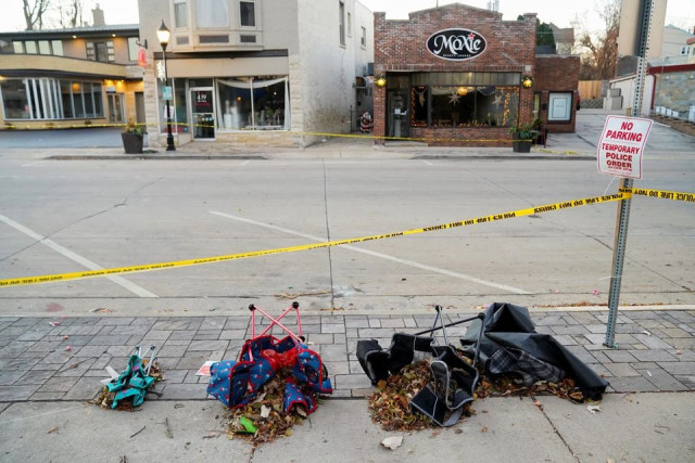 chairs are left abandonded on main street the morning after a car plowed through a holiday parade in waukesha wisconsin u s november 22 2021 photo reuters chairs are left abandonded on main street the morning after a car plowed through a holiday parade in waukesha wisconsin u s november 22 2021 photo reuters