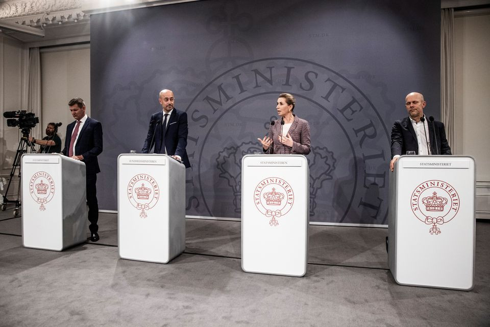 denmark s prime minister mette frederiksen speaks during a news conference on the coronavirus disease covid 19 alongside the director of the national board of health soeren brostroem minister of health magnus heunicke and director of statens serum institut ssi henrik ullum in the mirror hall in the pm s office at christiansborg palace in copenhagen denmark november 8 2021 photo reuters