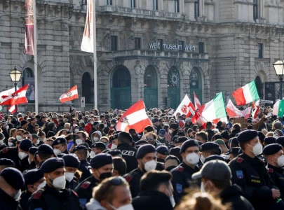 tens of thousands march in vienna against covid measures before lockdown