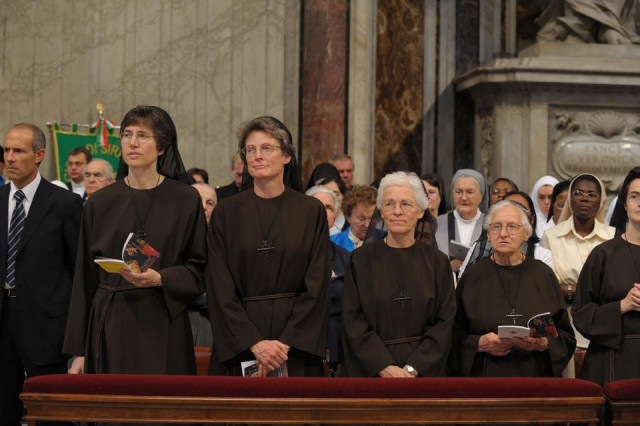 sister raffaella petrini l looks on during a mass in saint peter s basilica at the vatican in this undated handout photo obtained by reuters on november 4 2021