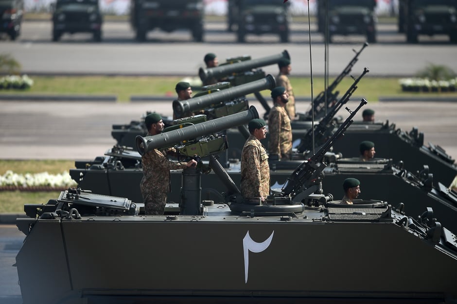 Tank crews steer their vehicles during the Pakistan Day military parade in Islamabad. PHOTO: AFP