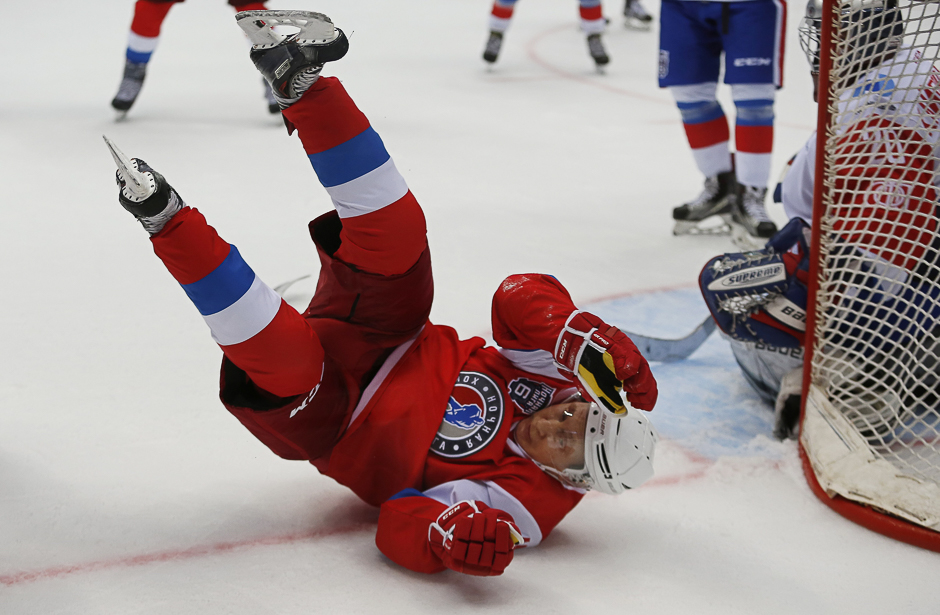 Russian President Vladimir Putin takes part in a gala match of the hockey teams of the Night League at the Shayba Olympic Arena in Sochi, Russia. PHOTO: REUTERS