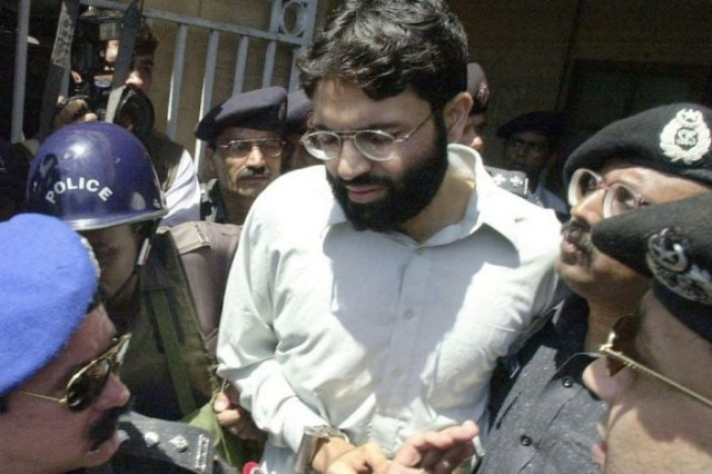 ahmed omar saeed sheikh c pictured 2002 who had been convicted over the 2002 killing of american journalist daniel pearl was ordered released on december 24 2020 photo afp
