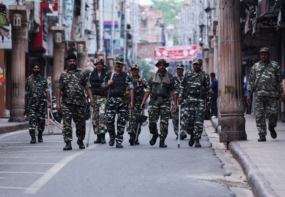 Security personnel patrol along a street in Jammu on August 6, 2019. (Photo: Rakesh BAKSHI / AFP)