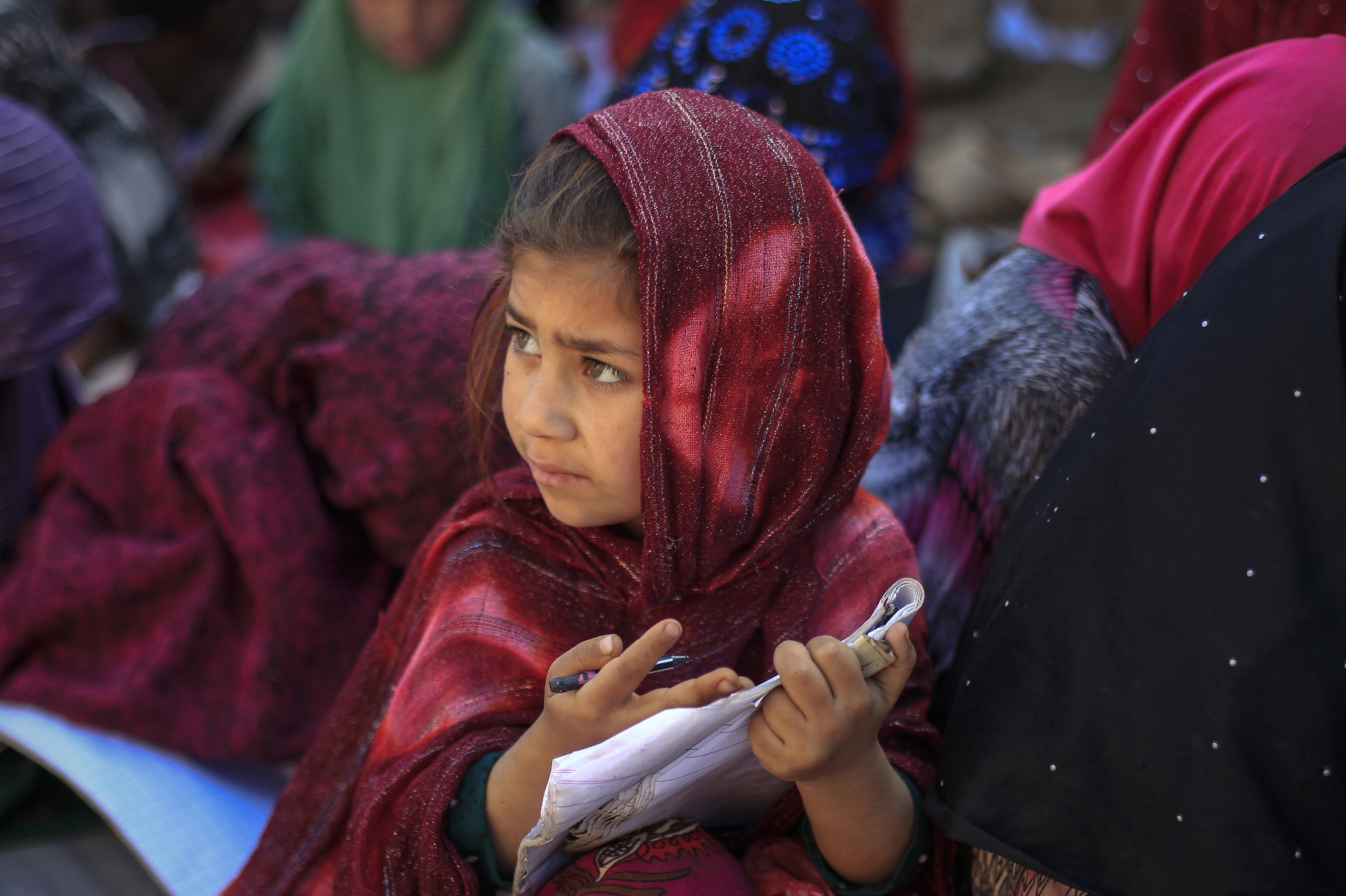 a girl attends a class at a makeshift school on the outskirts of islamabad april 7 2014 photo reuters file