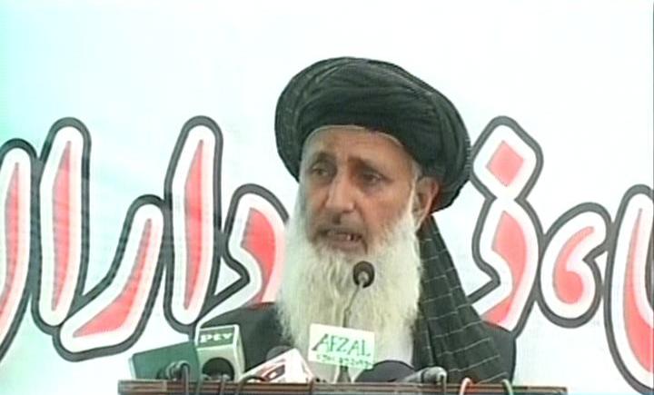 express news screengrab of professor ibrahim speaking to a gathering at jamaat e islami ji offices in peshawar on april 27 2014