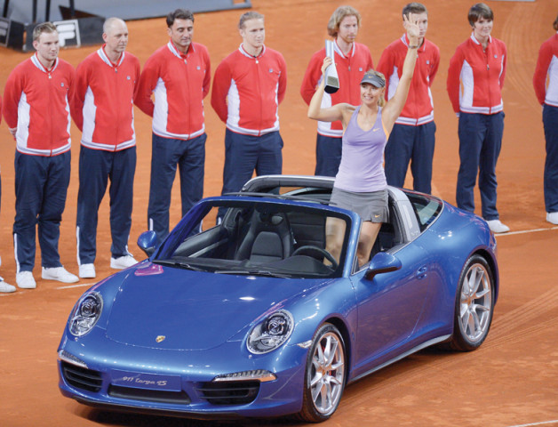 sharapova recovered from a set down to beat ivanovic and claim her 30th career title photo afp