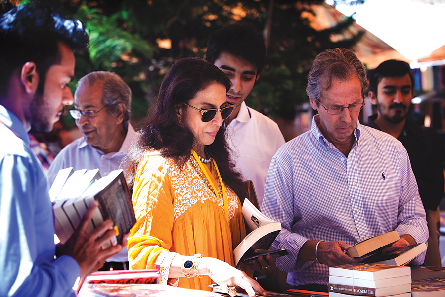 shobhaa de goes through books at one of the stalls photo myra iqbal express