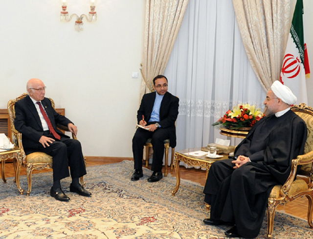advisor to prime minister sartaj aziz l in a meeting with the iranian president dr hassan rouhani photo pid