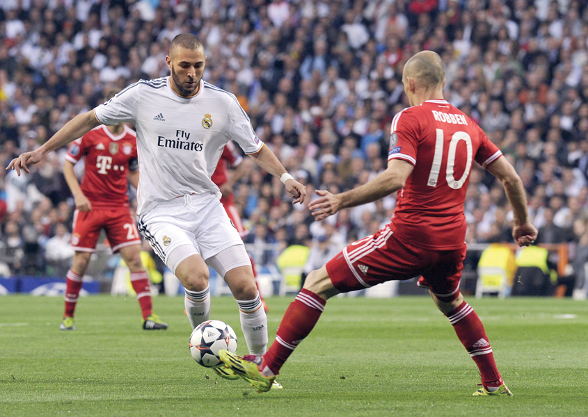 real madrid and bayern munich will be looking to dominate each other as the different styles of combat clash at the german giant s home ground photo afp