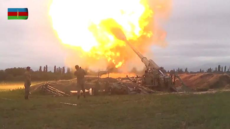 a video released by the azerbaijan s defense ministry shows members of azeri armed forces firing artillery during clashes between armenia and azerbaijan over the territory of nagorno karabakh september 28 photo reuters
