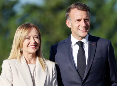 macron meloni seek united front in riviera talks