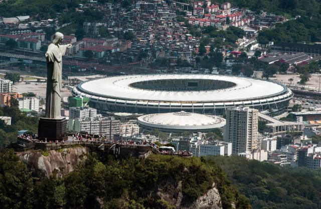 an aerial view of the christ the redeemer statue atop corcovado hill and the mario filho maracana stadium in rio de janeiro brazil on december 3 2013 photo afp an aerial view of the christ the redeemer statue atop corcovado hill and the mario filho maracana stadium in rio de janeiro brazil on december 3 2013 photo afp