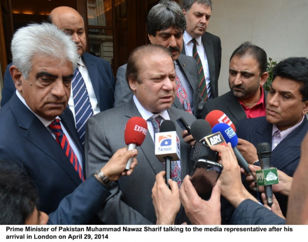 prime minister nawaz sharif talking to media persons after his arrival in london photo pid prime minister nawaz sharif talking to media persons after his arrival in london photo pid