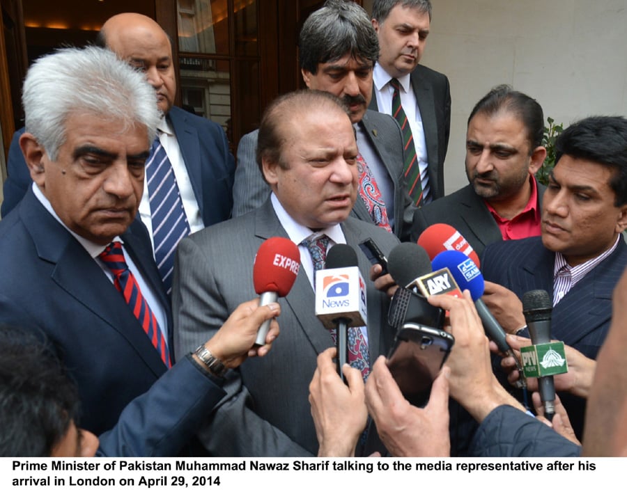 prime minister nawaz sharif talking to media persons after his arrival in london photo pid