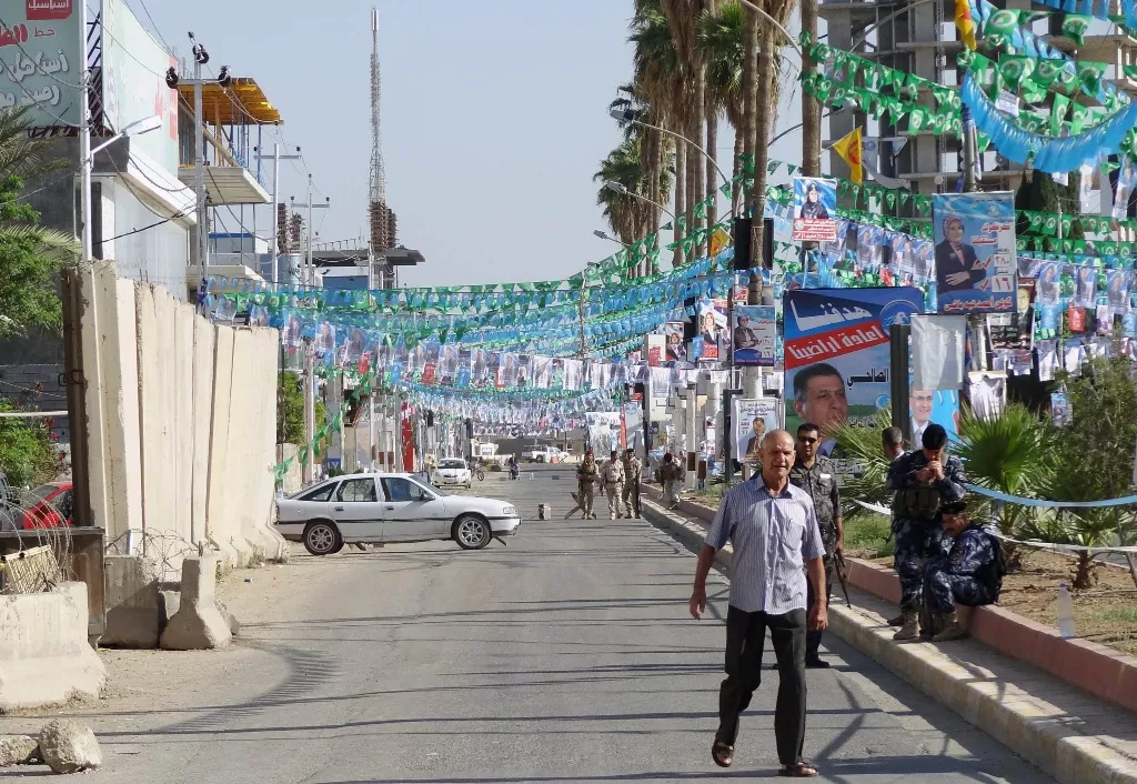 electoral posters are seen in the street in the northern iraqi city of kirkuk for first parliamentary election since us troops withdrew on april 30 2014 photo afp electoral posters are seen in the street in the northern iraqi city of kirkuk for first parliamentary election since us troops withdrew on april 30 2014 photo afp