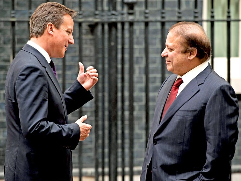 british pm david cameron greets nawaz sharif outside 10 downing street in central london photo afp