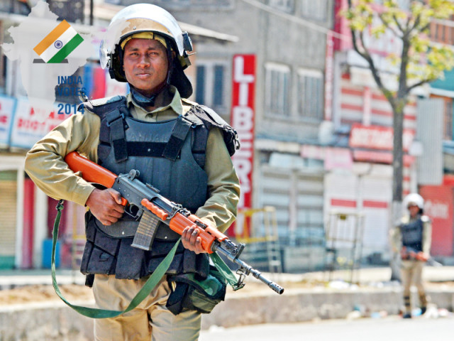 indian paramilitary personnel patrol during a curfew following the death of a youth in clashes between government forces and protesters photo afp