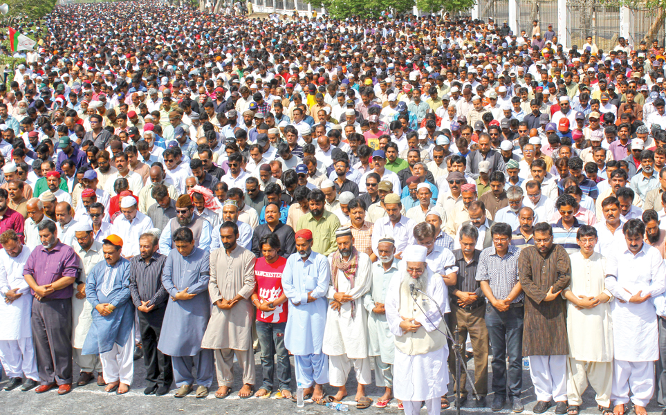 the funeral prayers of the remaining two victims were offered at main numaish chowrangi they were held after juma prayers and were lead by maulana tanvirul haq thanvi photo athar khan express