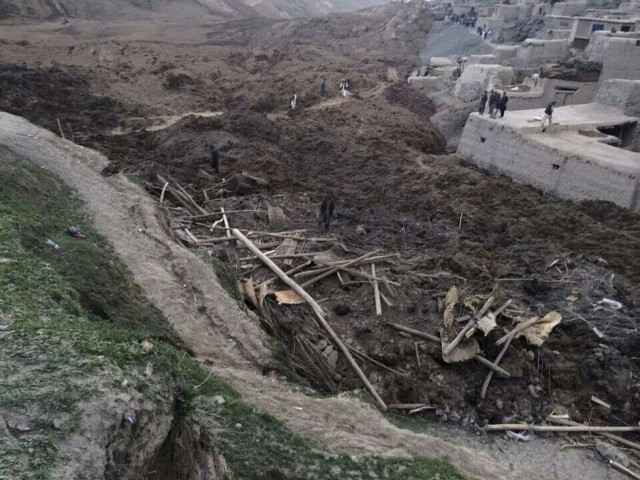villagers gather at the site of the landslide at argo district in badakhshan province photo reuters