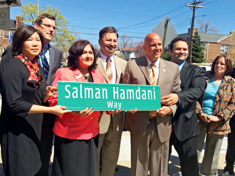 talat hamdani centre and new york city officials at an event to commemorate naming of salman hamdani way photo file