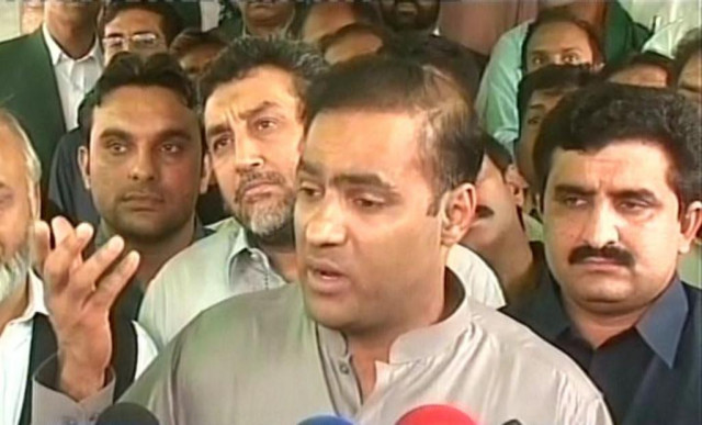express news screengrab of the minister of state for water and power abid sher ali speaking to the media in faisalabad express news screengrab of the minister of state for water and power abid sher ali speaking to the media in faisalabad