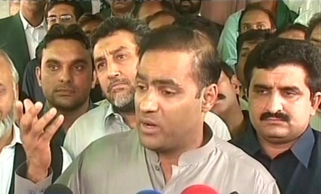 express news screengrab of the minister of state for water and power abid sher ali speaking to the media in faisalabad