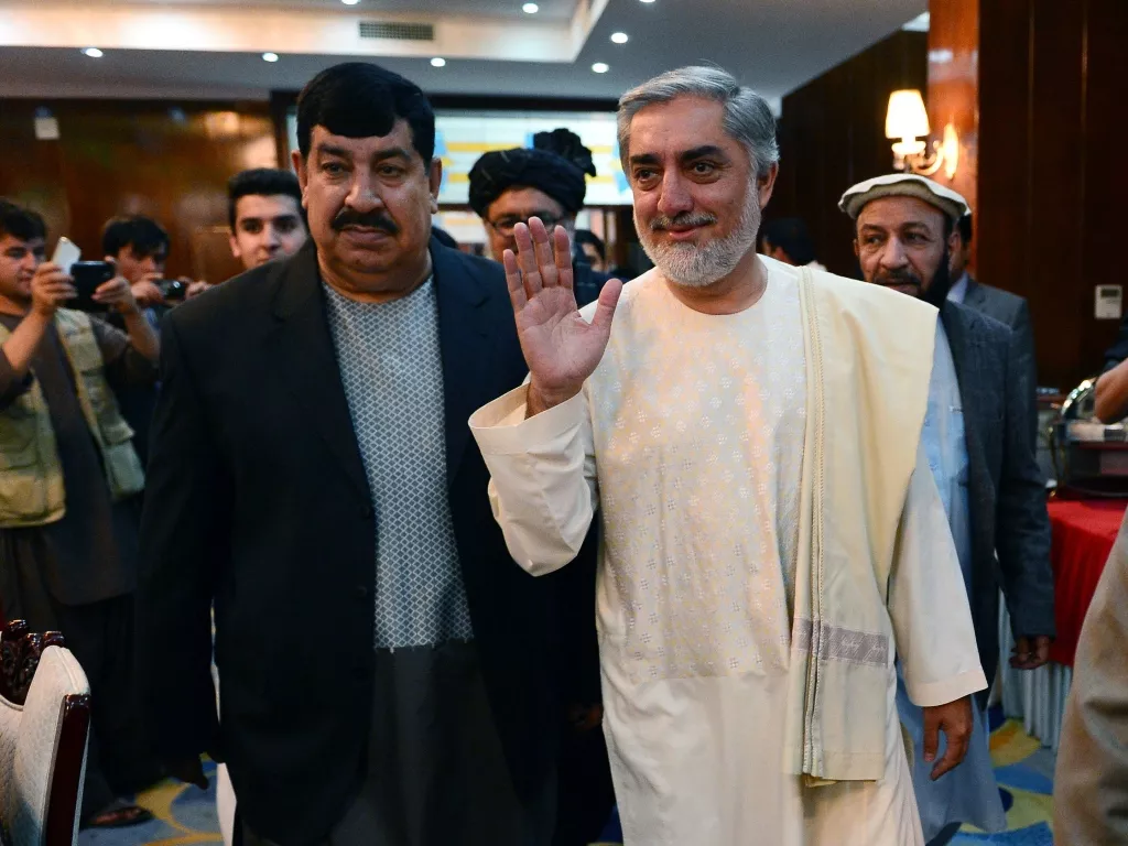 afghan presidential candidate abdullah abdullah r gestures as he arrives for a joint press conference with presidential candidate gul agha shirzai l in kabul photo afp afghan presidential candidate abdullah abdullah r gestures as he arrives for a joint press conference with presidential candidate gul agha shirzai l in kabul photo afp