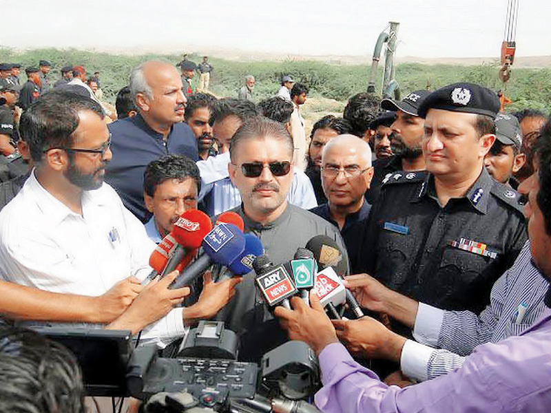 sindh information minister sharjeel memon talks to reporters after demolition of illegal hydrants in manghopir photo pio