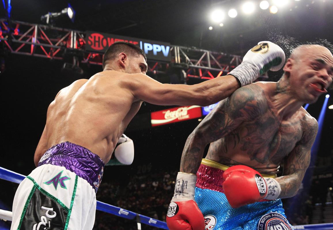 amir khan l of britain connects on luis collazo of the us during their welterweight fight at the mgm grand garden arena in las vegas nevada photo reuters