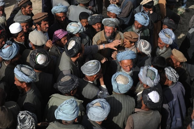 landslide affected afghan villagers gather to receive donated supplies near the scene of the incident in argo district in badakhshan on may 4 2014 photo afp landslide affected afghan villagers gather to receive donated supplies near the scene of the incident in argo district in badakhshan on may 4 2014 photo afp