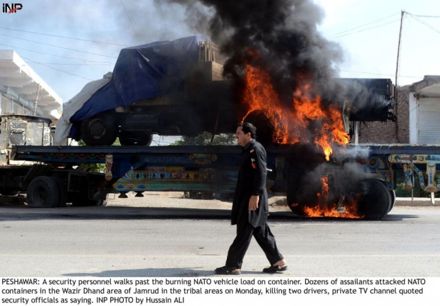 quot the three container trucks were on their way to afghanistan when gunmen opened fire at them quot said an official photo inp quot the three container trucks were on their way to afghanistan when gunmen opened fire at them quot said an official photo inp