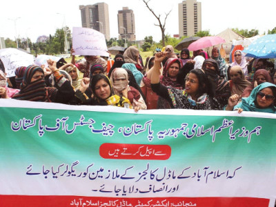 protest teachers demand release of pay regularisation