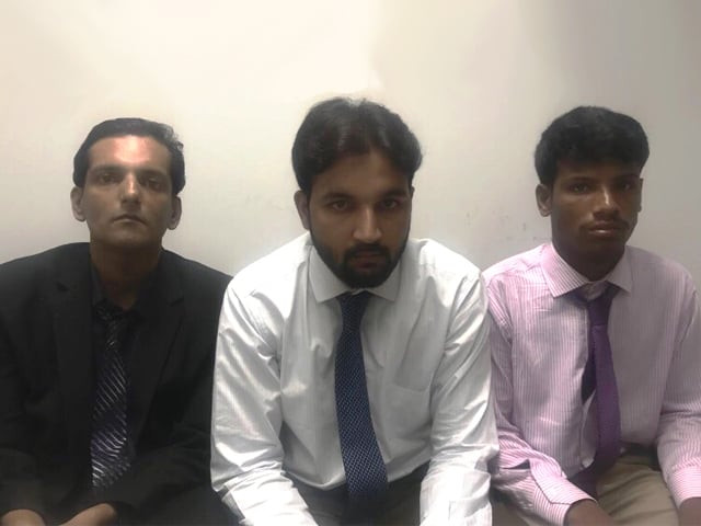 the three men were then taken inside the investigation room by fia officers where their questioning began photo raja faisal