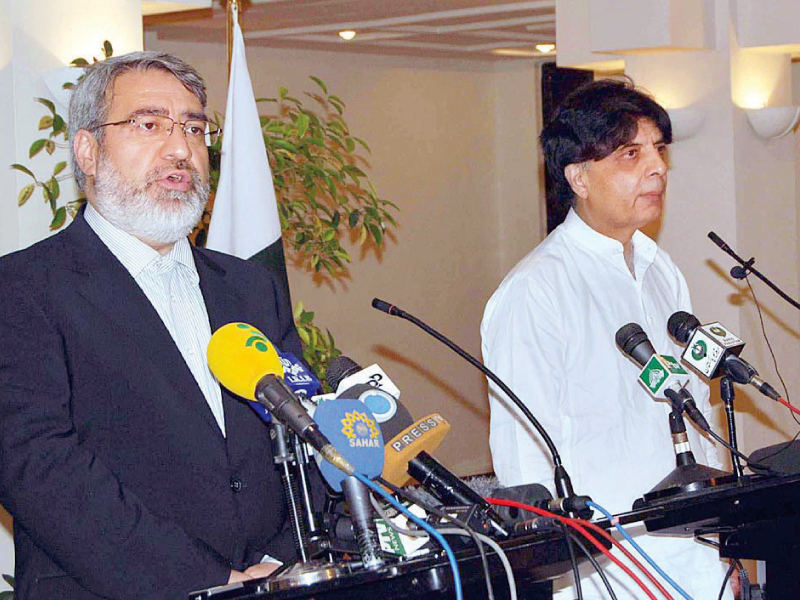 interior minister chaudhry nisar addresses the media along with his iranian counterpart abdolreza rahmani fazli photo app