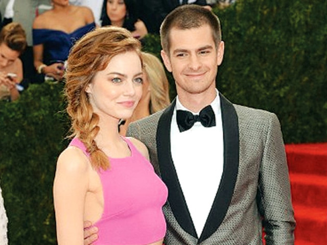 emma stone and andrew garfield looked stunning on the red carpet together emma stone and andrew garfield looked stunning on the red carpet together