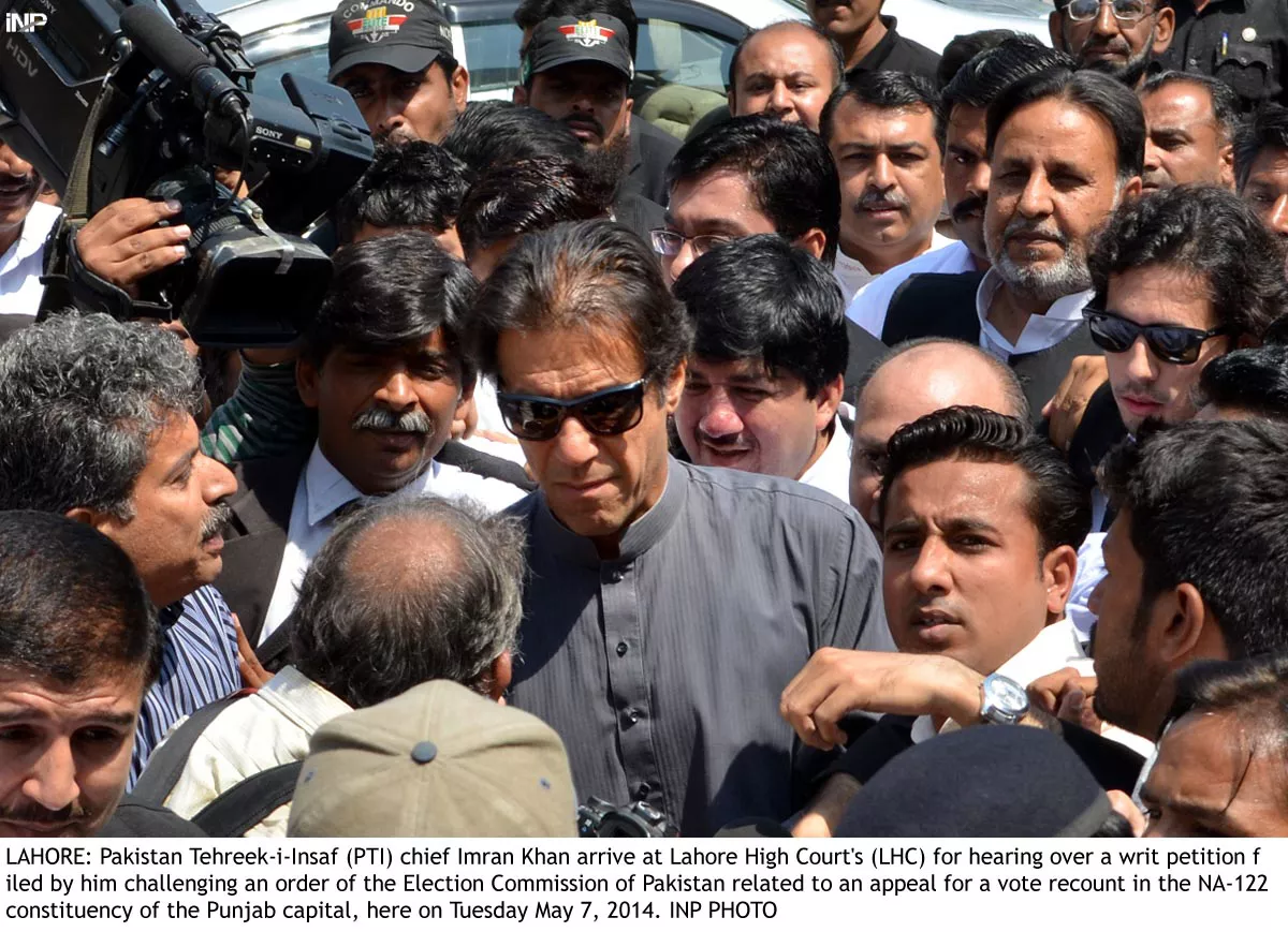 a large number of his supporters had tried to follow him to the courtroom of the chief justice when imran khan arrived at the lhc photo inp a large number of his supporters had tried to follow him to the courtroom of the chief justice when imran khan arrived at the lhc photo inp