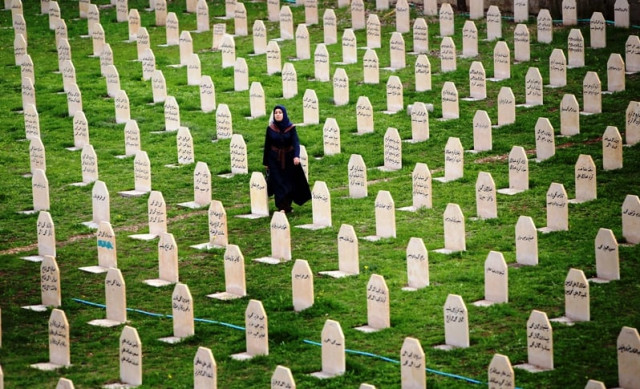 a file picture taken on march 16 2014 shows an iraqi kurd woman visiting a grave yard for the victims of a gas attack by former iraqi president saddam hussein in 1988 as people mark the 26th anniversary of the attack in the kurdish town of halabja 300 kms northeast of baghdad photo afp a file picture taken on march 16 2014 shows an iraqi kurd woman visiting a grave yard for the victims of a gas attack by former iraqi president saddam hussein in 1988 as people mark the 26th anniversary of the attack in the kurdish town of halabja 300 kms northeast of baghdad photo afp