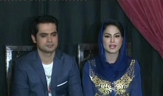express news screen grab of veena and her husband from the press conference express news screen grab of veena and her husband from the press conference