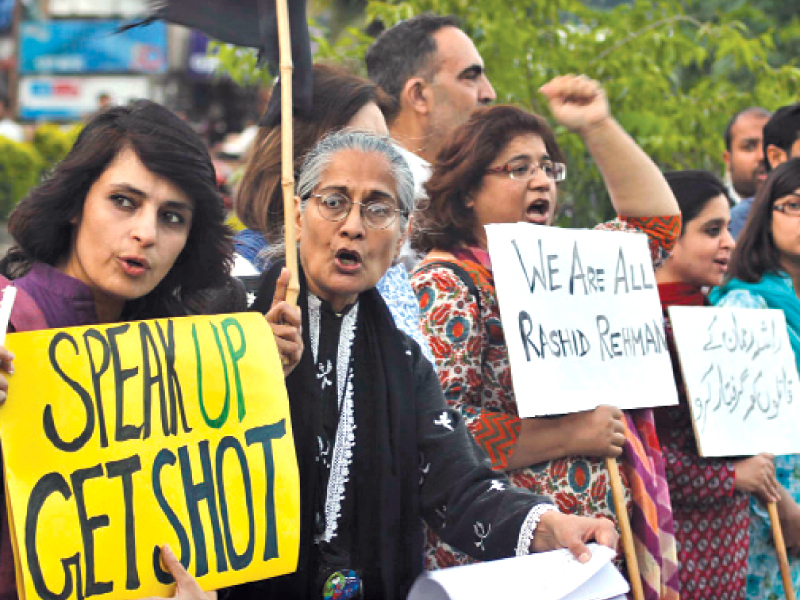 human rights and civil society activists stage protest in super market islamabad against rashid rahman s murder photo muhammad javaid