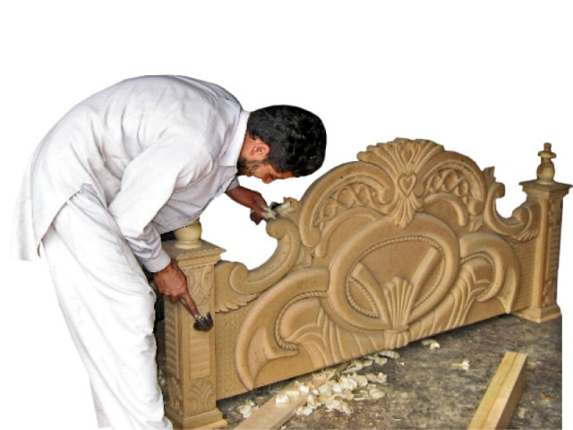 despite recent spate of militancy wood carvers say their business is looking up again photo sherinzada express despite recent spate of militancy wood carvers say their business is looking up again photo sherinzada express