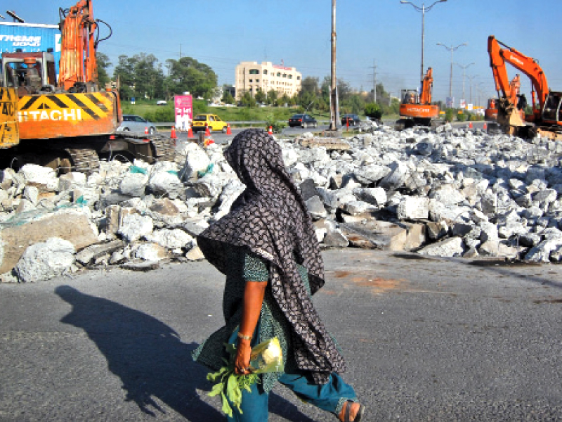 the rubble lies scattered on kashmir highway near peshawar mor photo file