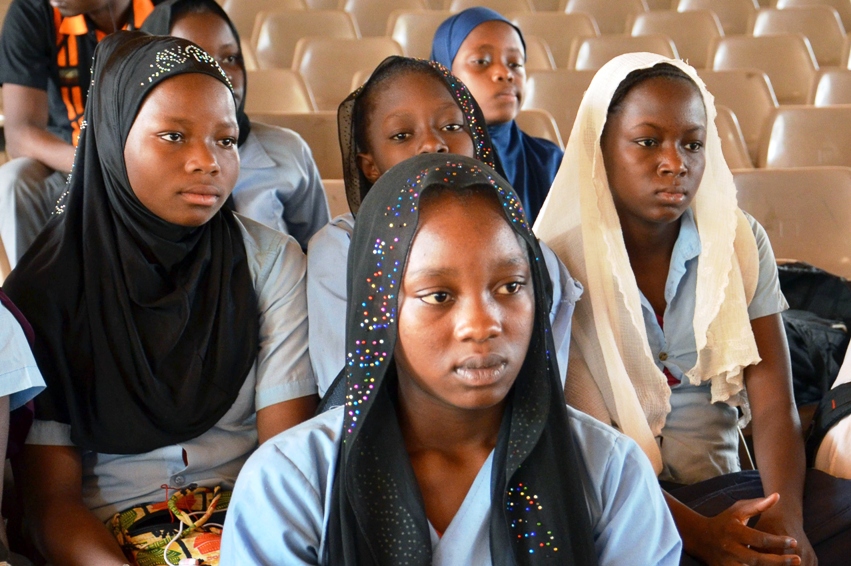 women sit as they gather on may 8 2014 during a meeting called by congafen the coordination of the ngos and nigerien women associations at the youth house in niamey western niger to ask the united nations un to pursue in justice boko haram who are responsible for the abduction of more than 200 schoolgirls photo afp