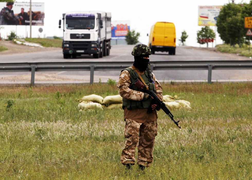 a ukrainian soldier secures an area outside the southern city of odessa on may 9 2014 photo afp