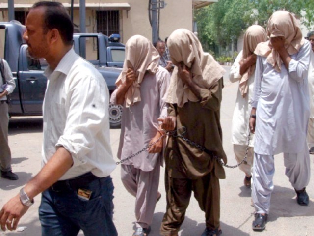 four police constables imran ali yasin jamali rashid and maqbool have been remanded into police custody till may 15 for allegedly shooting at an 18 year old boy photo mohammad saqib express