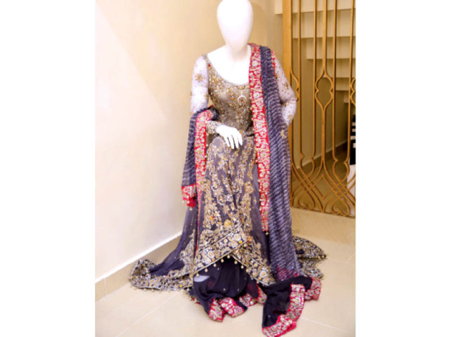 the intricate and ornate detailing on the outfits is a testament to the excellent workmanship photo express the intricate and ornate detailing on the outfits is a testament to the excellent workmanship photo express